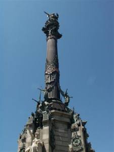 The Kolumbusstatue at the port, directly at the end Las Ramblas.  It shows a lying Kolumbus, because the direction, to which it points, is not the directionto the New Welt. 
